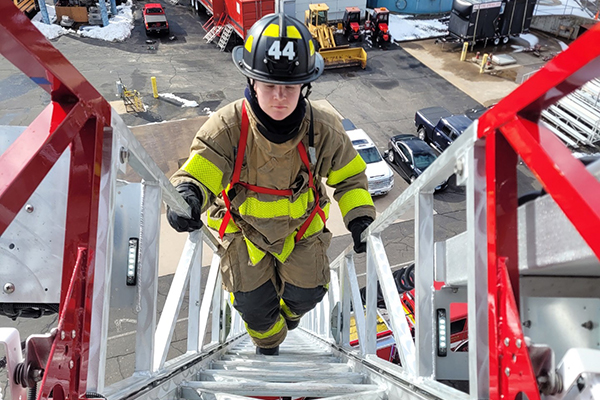 Fireman on ladder.